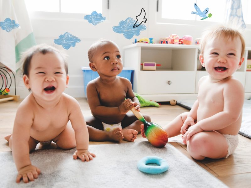 Babies playing together in a play room